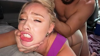 Amateur blonde with perky tits giggles while giving a blowjob