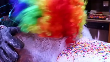 Gibby the clown turns Victoria's ample derriere into a sweet treat