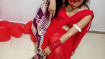 Young Indian bride in red attire celebrates Valentine's Day with her husband