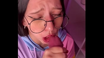 Asian brunette with glasses gives sloppy blowjob after classes