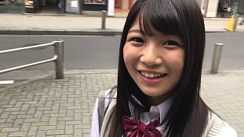 A tidy and attractive woman with long black hair, dressed like a uniformed schoolgirl, visits a renowned location in Tokyo. The experience of filming intensifies my arousal as I engage in sexual acts with eagerness and positivity.