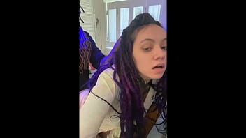 A man wearing a mask penetrates a Latina with dreadlocks in a kitchen in doggy style, while also satisfying foot fetish and homemade desires