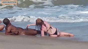 Stranger on the beach allows threesome with two women and average dick